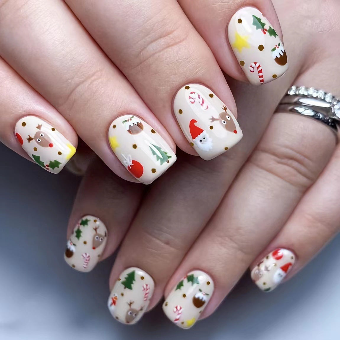 US$2,6/set Uñas postizas navideñas con diseños variados, regalos sorpresa increíbles para mamás, hermanas y niñas, 5 juegos, envío gratis