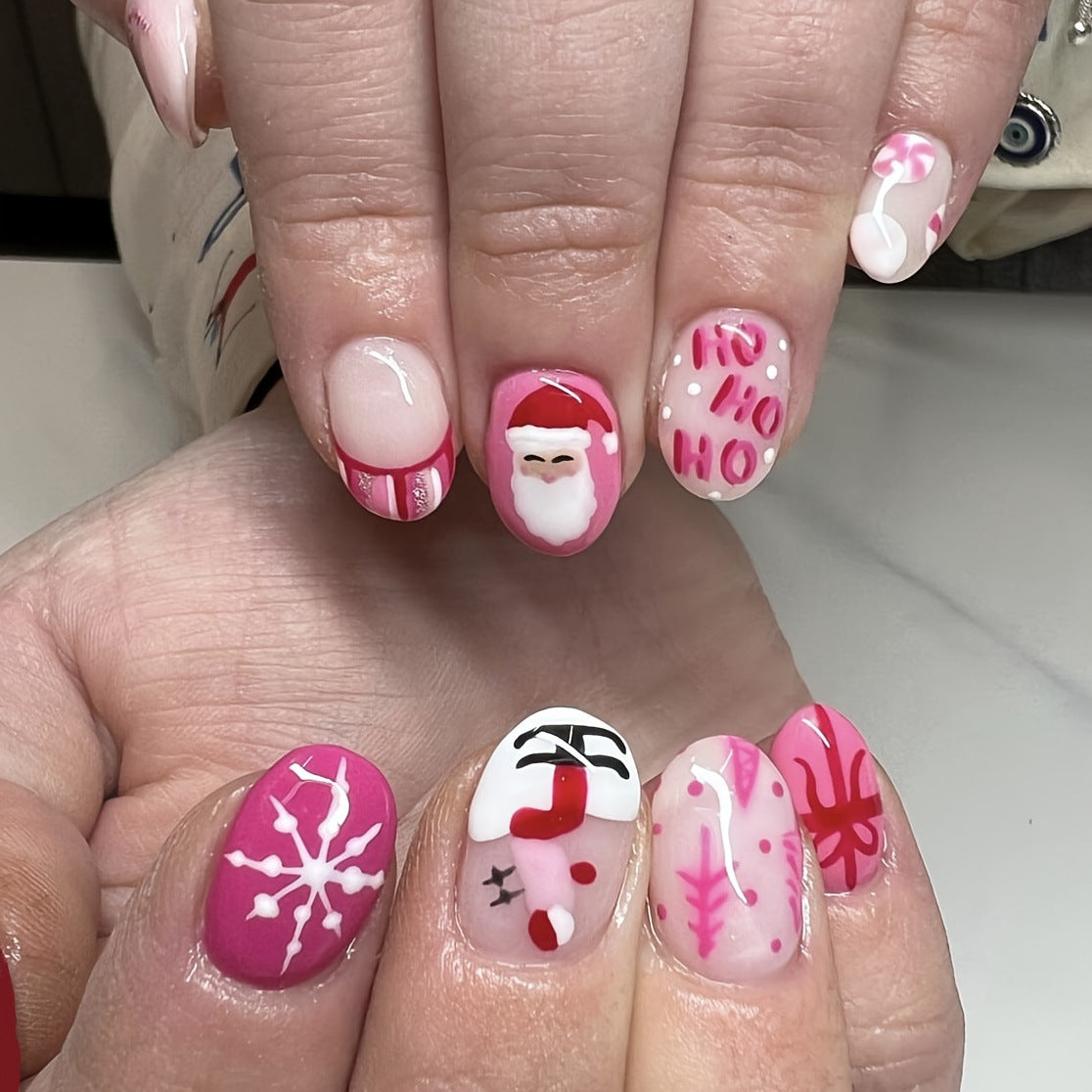 US$2,6/set Uñas postizas navideñas con diseños variados, regalos sorpresa increíbles para mamás, hermanas y niñas, 5 juegos, envío gratis